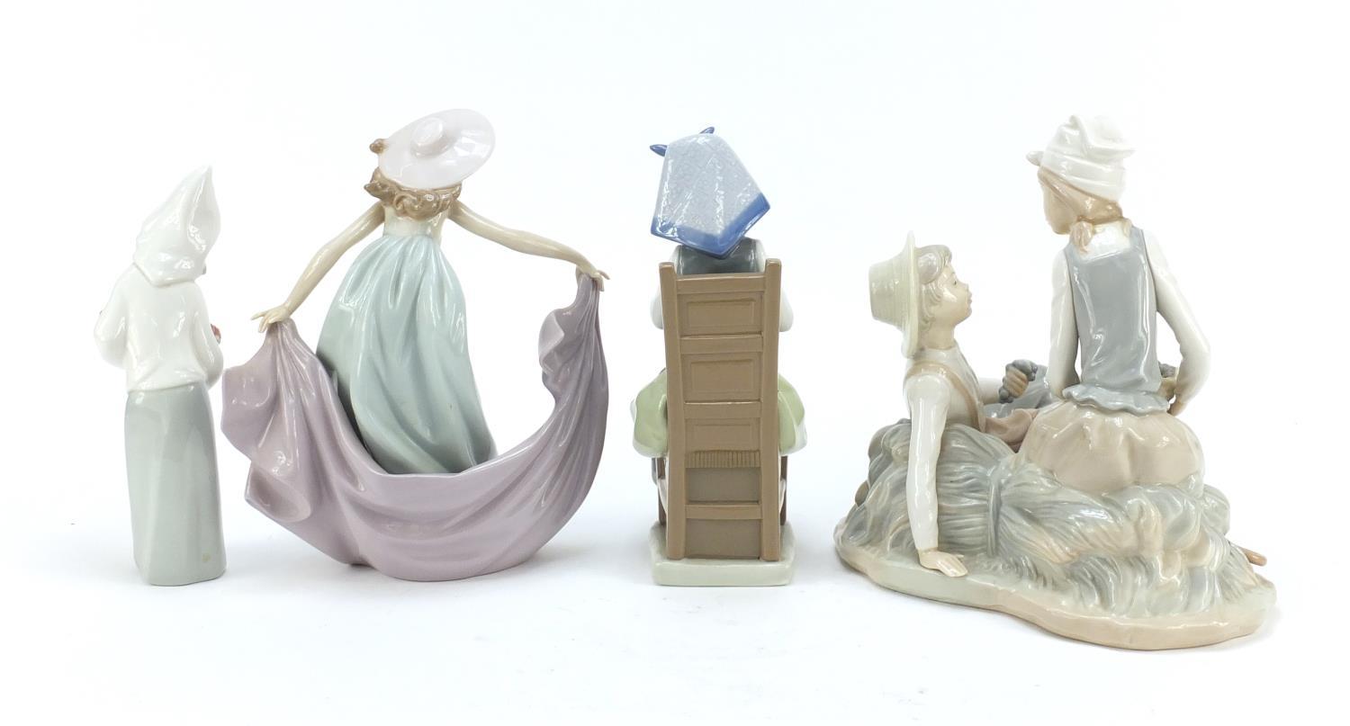 Four Lladro and Nao figure groups, the largest 23cm high : For Further Condition Reports Please - Image 5 of 10