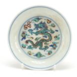 Chinese doucai porcelain dish hand painted with dragons in clouds chasing flaming pearls, six figure
