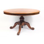 Oval walnut tilt top table, 68cm D x 120cm W x 81cm D : For Further Condition Reports Please Visit