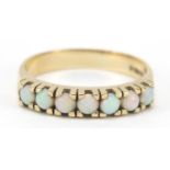 9ct gold opal seven stone ring, size S, 3.4g : For Further Condition Reports Please Visit Our