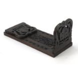 Indian extending book slide carved with flowers, 34cm wide when closed : For Further Condition