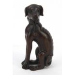 Japanese boxwood Netsuke of a seated dog with character marks, 6.2cm high : For Further Condition