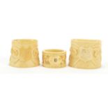 Three ivory napkin rings carved with flowers, the largest 5.3cm high : For Further Condition Reports
