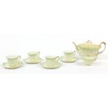Wileman Foley teaware comprising a teapot and four cups with saucers, the teapot 23cm in length :