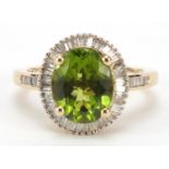 9ct gold peridot and baguette cut diamond ring, size O, 4.2g : For Further Condition Reports