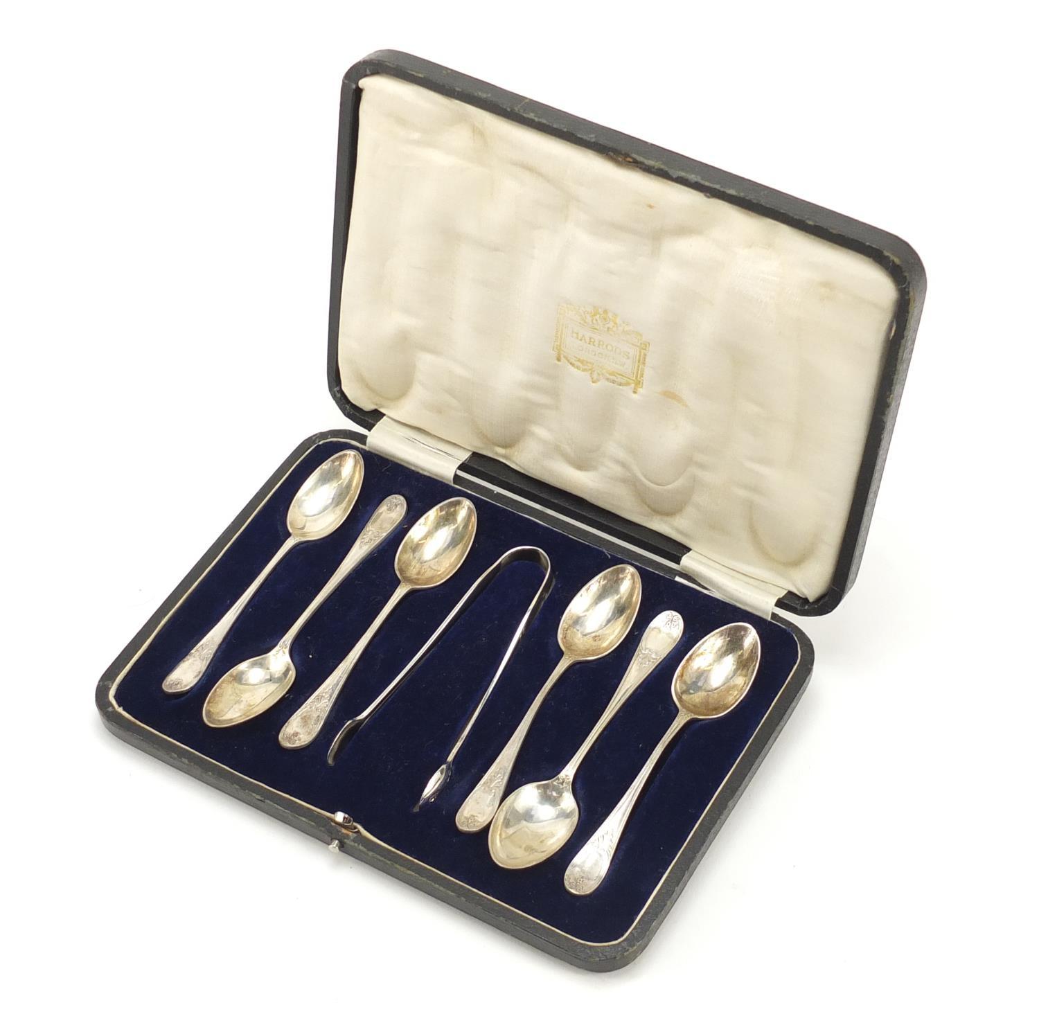 James Dixon & Sons, Set of six George V silver teaspoons and sugar tongs housed in a Harrods case,