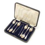 James Dixon & Sons, Set of six George V silver teaspoons and sugar tongs housed in a Harrods case,