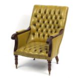 Regency style mahogany library chair with mustard leather button back upholstered back and seat,