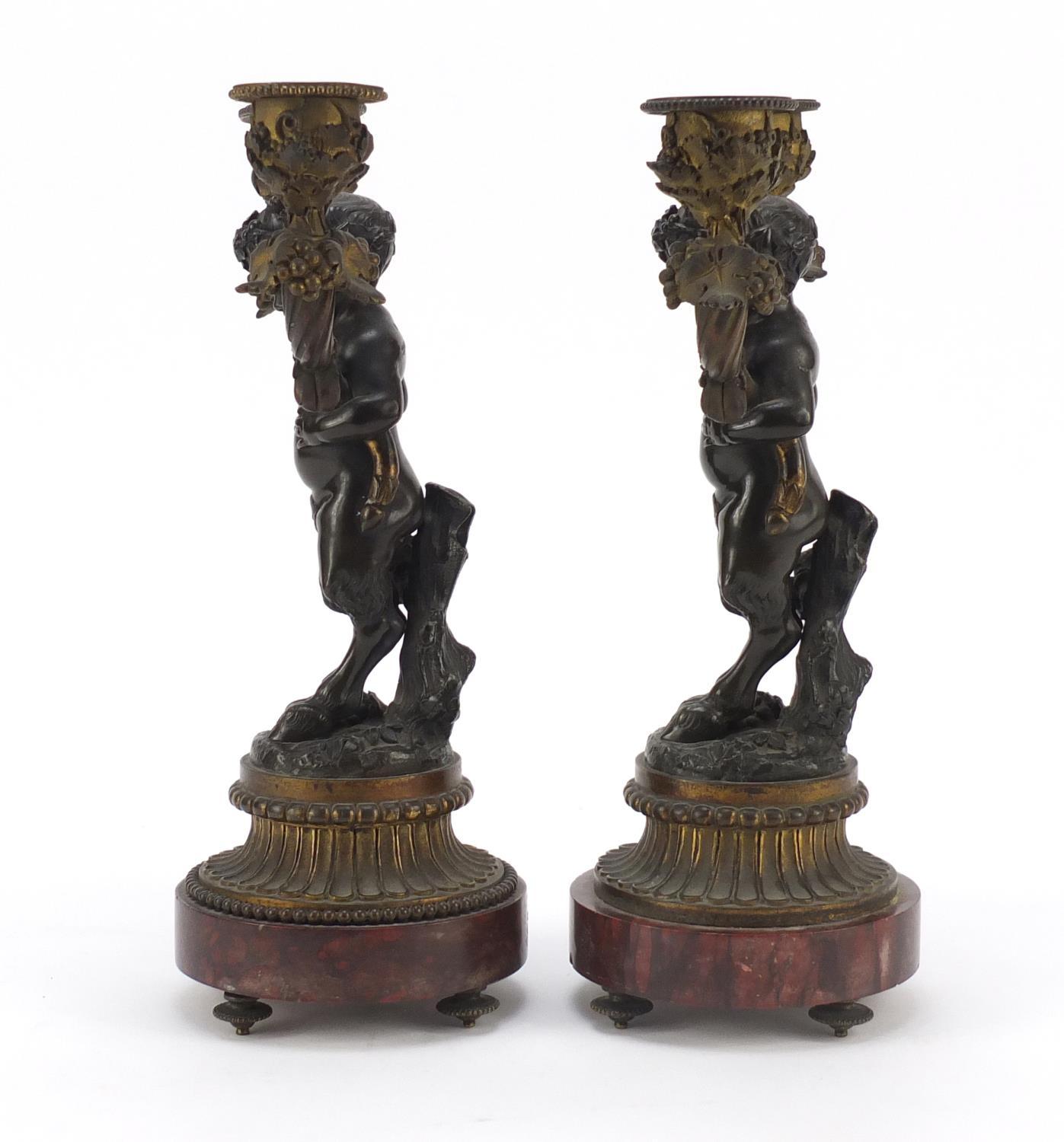 After Claude Michel Clodion, pair of 19th century patinated bronze figural two branch candlesticks - Image 4 of 8