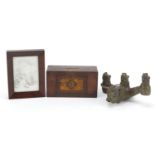 Antique objects including bronze tap in the form of an oxen with three maidens and a mahogany