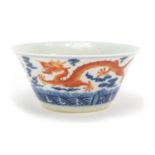 Chinese porcelain bowl hand painted with dragons in clouds chasing flaming pearls, six figure