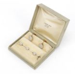 Set of gentlemen's 14ct gold mother of pearl dress studs and cufflinks housed in a Lambert Bros of