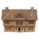 Large Robert Stubbs Tudor style doll's house, 128cm wide : For Further Condition Reports Please