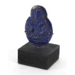 Chinese lapis lazuli pendant carved with a seated Buddha on stand, the carving 5.2cm high : For