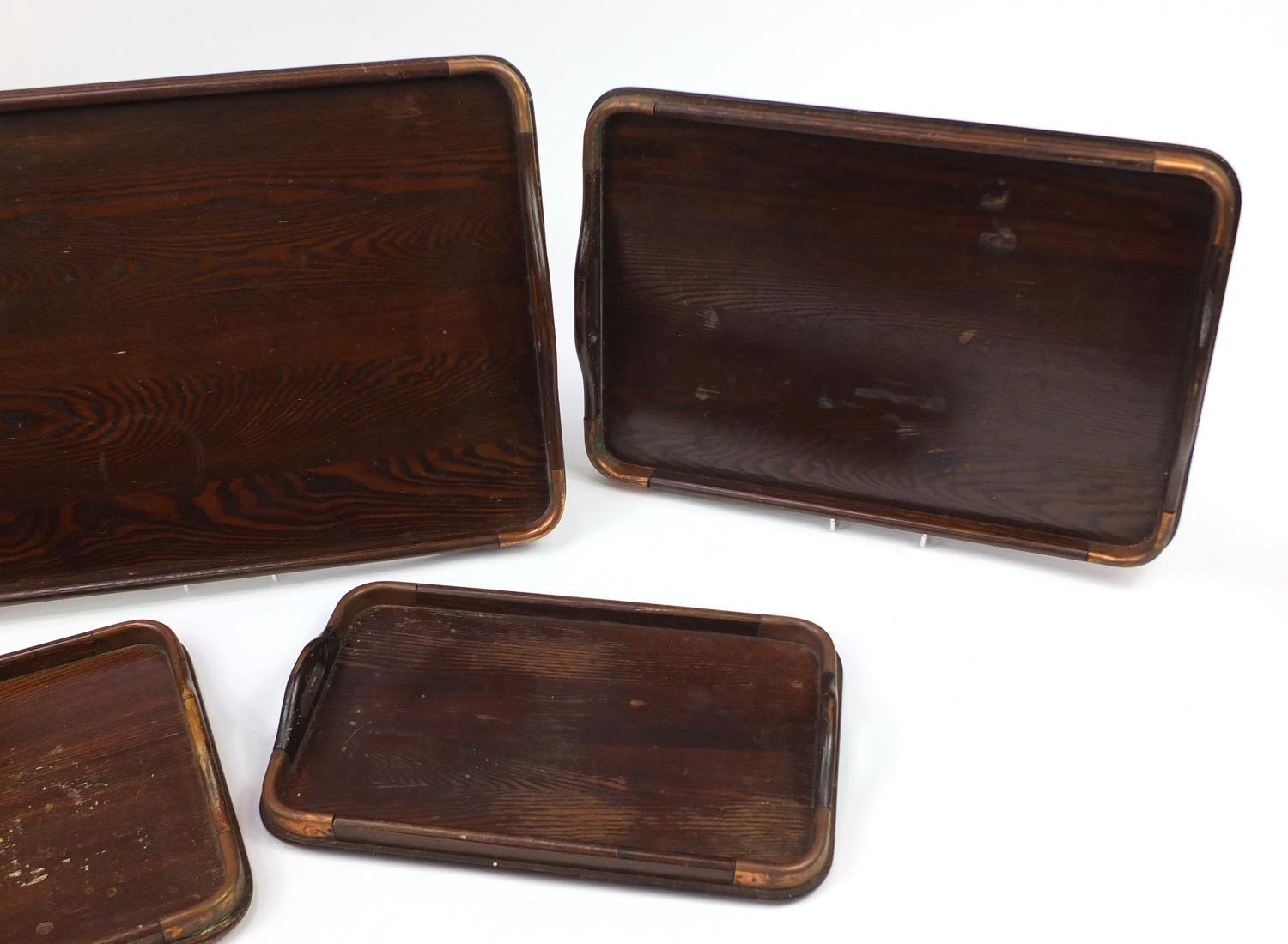 Graduated set of five oak trays with copper mounts, the largest 62cm x 44cm : For Further - Image 3 of 6