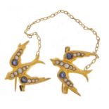 9ct gold swallow design brooch set with seed pearls and sapphires, 10.5cm in length, 2.2g : For