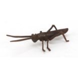 Japanese patinated bronze locust, impressed marks to the base, 11.5cm in length : For Further