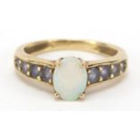 9ct gold opal and purple stone ring, size O, 2.7g : For Further Condition Reports Please Visit Our