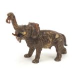 Cold painted bronze of an elephant in the style of Franz Xaver Bergmann, 9.5cm in length : For