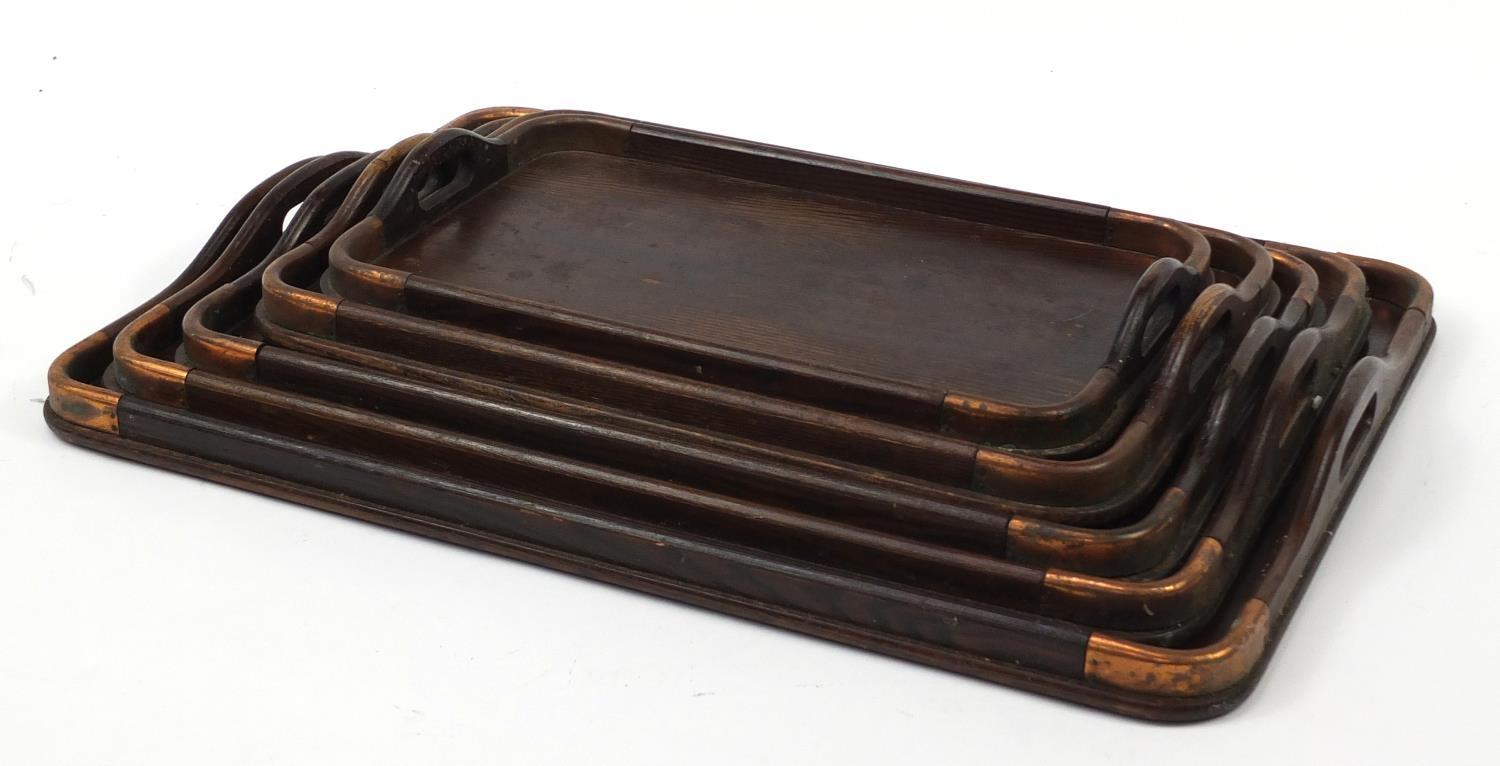 Graduated set of five oak trays with copper mounts, the largest 62cm x 44cm : For Further - Image 6 of 6