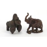 Two Japanese patinated bronze animals of a gorilla and elephant, the largest 5cm high : For