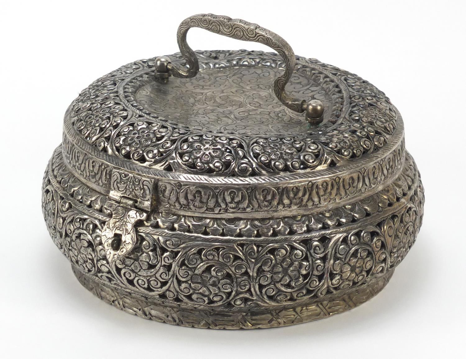 Burmese silver coloured metal pierced container embossed with flowers, 21cm in diameter, 820g :