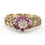 9ct gold ruby and diamond flower head ring, size P, 2.5g : For Further Condition Reports Please