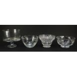 Three cut glass fruit bowls and a stem bowl, including one by Stuart ecthed with flowers, the