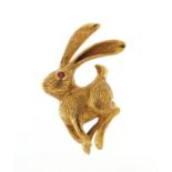 18ct gold brooch in the form of a hare with ruby eye, by Crosse? 3.5cm in length, 8.0g : For Further
