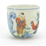 Chinese doucai porcelain tea cup, hand painted with a young boy and chicken, calligraphy to the
