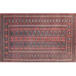 Pakistan wool rug with geometric design onto a salmon ground, 152cm x 100cm : For Further