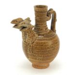 Continental glazed pottery jug with twin bird head spout, possibly South American, 16cm high : For