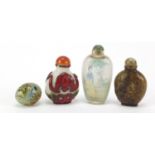 Three Chinese snuff bottles including one internally decorated and a hand painted stone egg, the