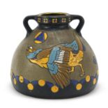 French Art Deco twin handled pottery vase enamelled with stylised rooster and flowers, indistinct
