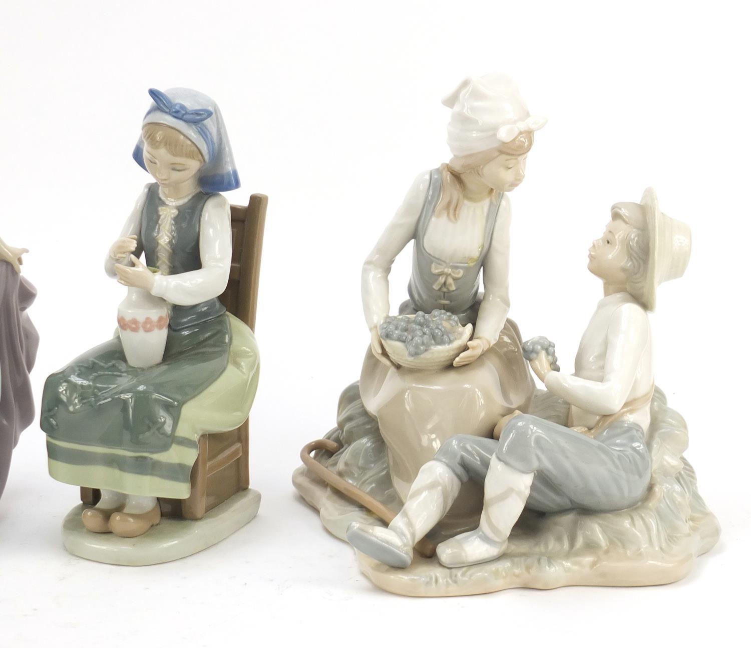 Four Lladro and Nao figure groups, the largest 23cm high : For Further Condition Reports Please - Image 3 of 10