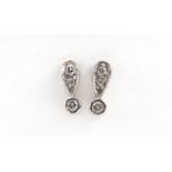 Pair of 18ct white gold diamond stud earrings, 8mm in length, 1.4g : For Further Condition Reports
