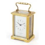 Brass cased carriage clock with Roman numerals by William Widdop, 10.5cm high : For Further