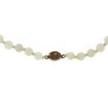 Chinese pale green jade bead necklace with silver gilt clasp, 54cm in length : For Further Condition