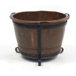 Arts & Crafts copper and wrought iron planter, impressed A8 tested to the rim, 22cm high x 46cm wide