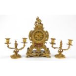19th century French Ormolu acanthus design mantle clock with two branch candlestick garnitures,