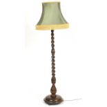 Oak barley twist standard lamp with green shade, overall 173cm high : For Further Condition