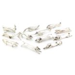 Eleven Art Deco silver plated knife rests in the form of stylised animals, 7.5cm long : For