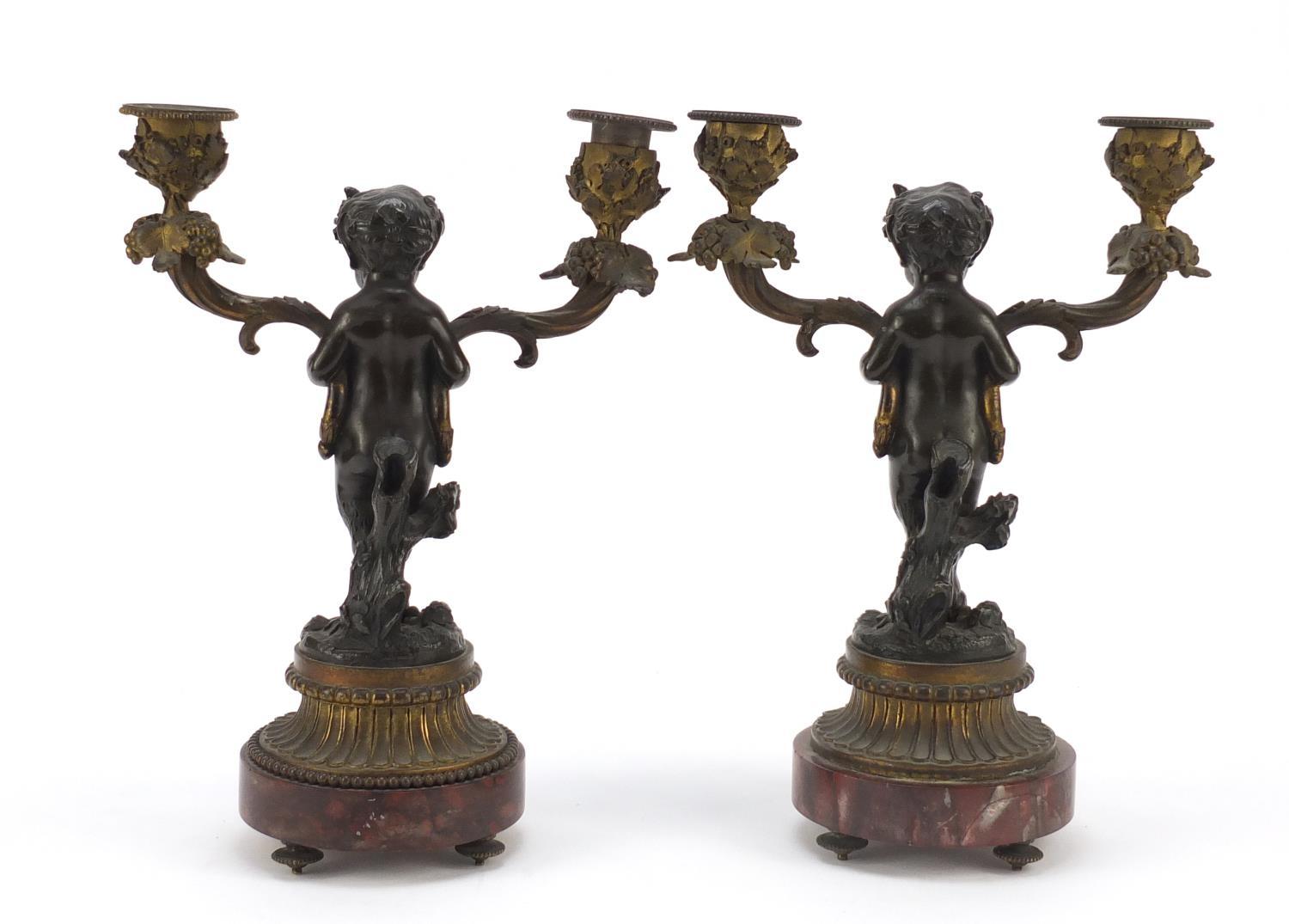 After Claude Michel Clodion, pair of 19th century patinated bronze figural two branch candlesticks - Image 5 of 8