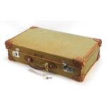Military interest leather bound canvas suitcase, stamped marks to the interior, 25.5cm wide : For