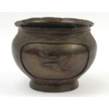 Japanese bronze jardiniere cast in relief with birds by a lake, 22cm high x 27cm in diameter : For