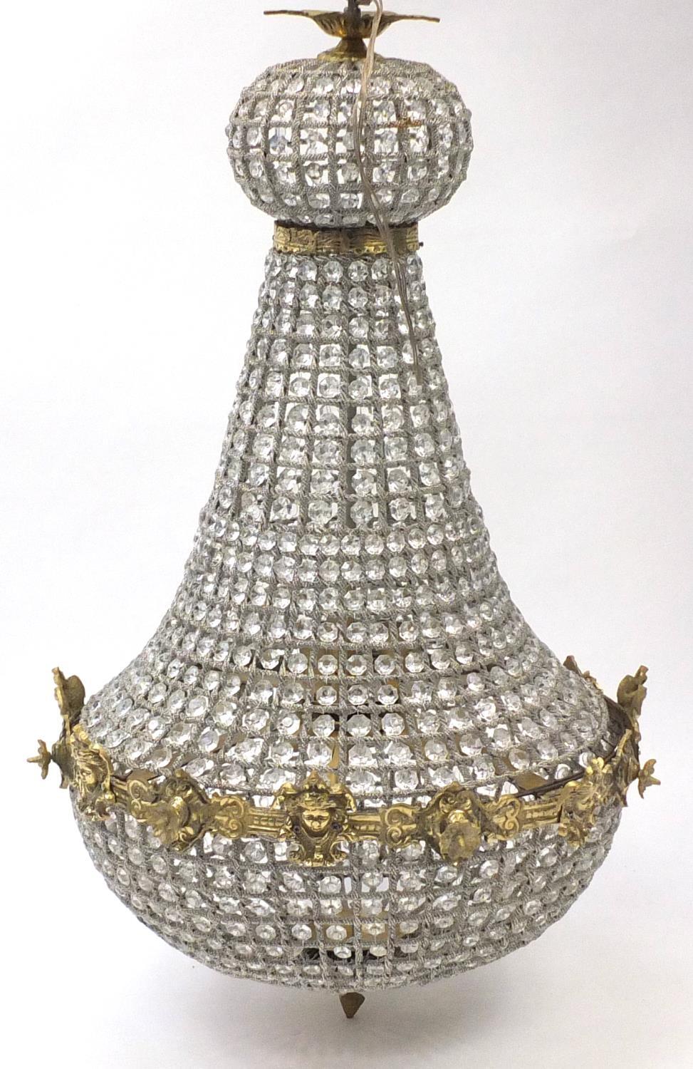 Large French style chandelier with gilt metal mounts, 90cm high : For Further Condition Reports