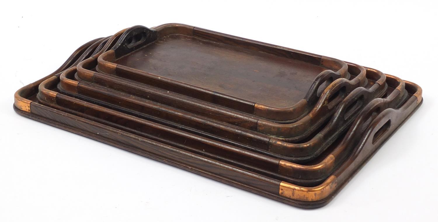 Graduated set of five oak trays with copper mounts, the largest 62cm x 44cm : For Further - Image 5 of 6