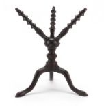 Rare George III mahogany cat with wrythen turned upper sections, raised on tripod legs with pad