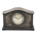 Silver plated mantle clock with silvered dial having Roman numerals inscribed Searle & Co Ltd,