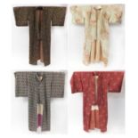 Four Japanese kimonos with floral decoration, each approximately 150cm high : For Further